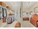 Organized walk-in closet with shelving and hanging storage at 8012 18Th W Ave, Bradenton, FL 34209