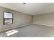 Bright bedroom features large windows and plush carpet at 8046 Anthirium Loop, Sarasota, FL 34240