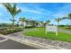 The Gathering Place community center with brick paved driveway and lush landscaping at 8046 Anthirium Loop, Sarasota, FL 34240