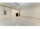 Spacious garage features epoxy flooring and ample storage space at 8046 Anthirium Loop, Sarasota, FL 34240