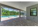 Outdoor patio with brick pavers and a screened-in pool at 8046 Anthirium Loop, Sarasota, FL 34240