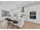 Well-appointed kitchen with island seating, stainless steel appliances, and modern design at 8330 Abingdon Ct, University Park, FL 34201