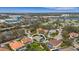 Aerial view of a community featuring beautiful landscaping, and a lake at 8420 Sailing Loop, Lakewood Ranch, FL 34202