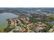 Lovely neighborhood aerial showcasing proximity to lake, green spaces, and community amenities at 8420 Sailing Loop, Lakewood Ranch, FL 34202