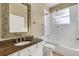 Bathroom featuring granite countertops, modern sink, and glass shower doors at 8420 Sailing Loop, Lakewood Ranch, FL 34202