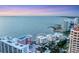 Elevated view showcasing waterfront condos with stunning panoramic water views at 97 Sunset Dr # 202, Sarasota, FL 34236