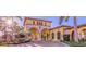 Beautiful entrance showcasing lush landscaping, elegant architecture, and a welcoming design at 12151 Amica Loop, Venice, FL 34293