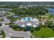 Overhead shot of clubhouse featuring pool, patio, and meticulously landscaped grounds at 12217 Cranston Way, Lakewood Ranch, FL 34211