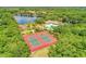Breathtaking aerial view of the community's amenities including a pool, tennis courts, and playground at 12263 Lavender Loop, Bradenton, FL 34212