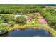 Beautiful aerial view of the community amenities including pool, playground, tennis, and basketball courts at 12263 Lavender Loop, Bradenton, FL 34212