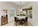 Cozy breakfast nook with large windows providing natural light, perfect for morning meals at 12263 Lavender Loop, Bradenton, FL 34212