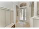 Bright and airy entryway featuring tile flooring, neutral paint, and access to living areas at 12263 Lavender Loop, Bradenton, FL 34212