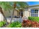 Inviting front porch with seating and landscaping for relaxing at 12263 Lavender Loop, Bradenton, FL 34212