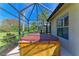 The outdoor screened lanai features a relaxing hot tub, perfect for unwinding after a long day at 12263 Lavender Loop, Bradenton, FL 34212