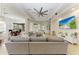 Inviting living room with recessed lights, large sectional sofa, and an open layout at 12263 Lavender Loop, Bradenton, FL 34212