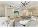 Bright living room with recessed lights, ceiling fan and an open floor plan at 12263 Lavender Loop, Bradenton, FL 34212