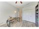 The office has wood-look tile floors, ample closet space and a ceiling fan at 12263 Lavender Loop, Bradenton, FL 34212