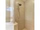 This bathroom features a tiled shower stall and updated shower head at 12263 Lavender Loop, Bradenton, FL 34212