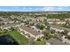 An expansive aerial view shows the community's layout, amenities, and landscaping at 14932 Amberjack Ter, Lakewood Ranch, FL 34202