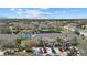 Aerial view showcases waterfront townhomes, lush landscaping, and convenient parking at 14932 Amberjack Ter, Lakewood Ranch, FL 34202