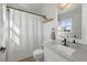 Modern bathroom features a vanity with a white countertop and a shower at 14932 Amberjack Ter, Lakewood Ranch, FL 34202