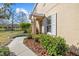 Attractive walkway with lush landscaping and mulch leading to the welcoming front door at 14932 Amberjack Ter, Lakewood Ranch, FL 34202