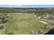 Expansive green sports field features a walking path, lake and basketball court at 14932 Amberjack Ter, Lakewood Ranch, FL 34202