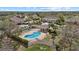 Community aerial view features a pool, spa, and a covered cabana surrounded by lush greenery at 14932 Amberjack Ter, Lakewood Ranch, FL 34202