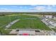 Aerial shot showcases multiple soccer fields surrounded by bleachers, landscaping and sports facility at 14932 Amberjack Ter, Lakewood Ranch, FL 34202