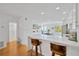 A modern kitchen with a large center island and an open floor plan at 1600 1St W Ave # 102A, Bradenton, FL 34205