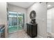 Bright kitchen with stainless steel appliances and a coffee cart that leads to a patio with laundry at 1620 Boathouse Cir # 101, Sarasota, FL 34231