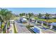 Grand community entrance with lush landscaping, elegant signage, and brick-paved roads at 16816 Seraphic Trl, Lakewood Ranch, FL 34211