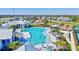 A refreshing community pool with lounge chairs and umbrellas, perfect for relaxation and recreation at 16816 Seraphic Trl, Lakewood Ranch, FL 34211