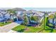 Beautiful single Gathering home with a two-car garage, paver driveway, and lush landscaping at 16816 Seraphic Trl, Lakewood Ranch, FL 34211