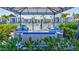 A comfortable outdoor lounge area with cushioned seating, perfect for relaxing by the community pool at 16816 Seraphic Trl, Lakewood Ranch, FL 34211