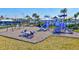 Outdoor community playground for the children to enjoy with slides and swings at 16816 Seraphic Trl, Lakewood Ranch, FL 34211