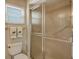 Bathroom features toilet and walk in shower at 1783 Lake Pl # 1783C, Venice, FL 34293