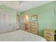 Bedroom leading to an ensuite bath and closet space at 1783 Lake Pl # 1783C, Venice, FL 34293