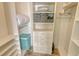 Walk in closet has ample shelving and drawer storage at 1783 Lake Pl # 1783C, Venice, FL 34293