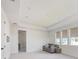 Spacious bonus room with natural light from three windows at 19912 Bridgetown Loop, Venice, FL 34293