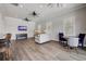 Open clubhouse living area featuring comfortable seating and a wall-mounted TV at 19912 Bridgetown Loop, Venice, FL 34293