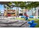 Inviting community area with colorful food trucks, seating, and lush landscaping for a vibrant gathering space at 19912 Bridgetown Loop, Venice, FL 34293