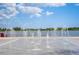 Interactive fountain with water jets and scenic lake views provides a refreshing and playful community amenity at 19912 Bridgetown Loop, Venice, FL 34293