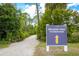 Walking trail to Heron Park, surrounded by natural Florida landscape at 19912 Bridgetown Loop, Venice, FL 34293