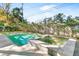 Beautifully landscaped pool and spa offer a serene escape, perfect for relaxation and outdoor enjoyment at 2177 Sunnyside Pl, Sarasota, FL 34239