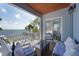 Relaxing balcony with patio furniture and an ocean view at 2407 Avenue A, Bradenton Beach, FL 34217