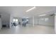Spacious basement area with seating and an abundance of light at 2407 Avenue A, Bradenton Beach, FL 34217