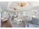 Inviting living room features wood floors, coastal decor, and a light, airy color palette at 2407 Avenue A, Bradenton Beach, FL 34217