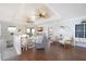 Upstairs Living Room and staircase features hard wood floors and coastal decor at 2407 Avenue A, Bradenton Beach, FL 34217