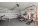 Spacious garage equipped with fitness equipment for convenient at-home workouts at 3266 Lanai Ave, North Port, FL 34288